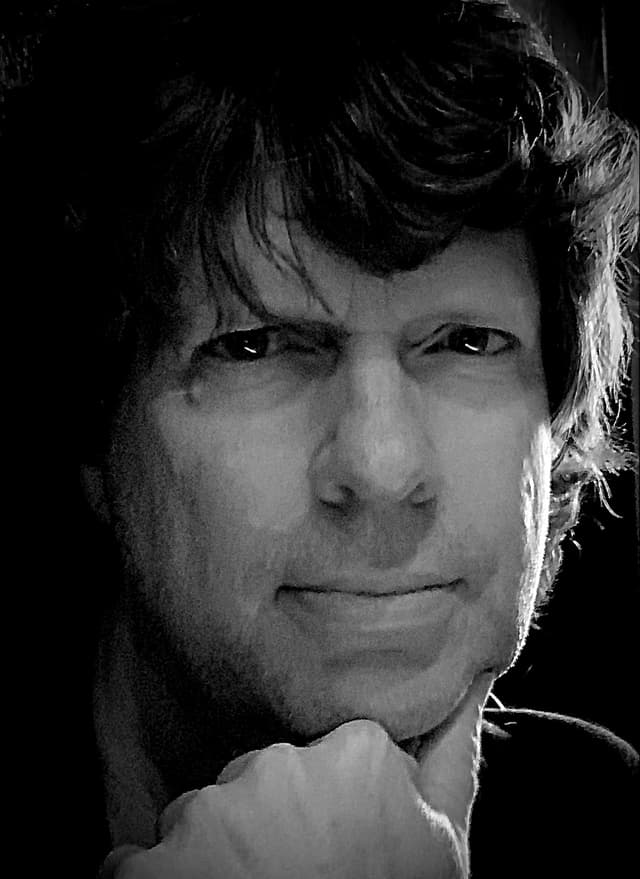 David Glass, a pianist and filmmaker, in a close-up portrait